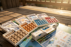 Rebirth 3D-Printed Game Organizer on cozy wooden porch